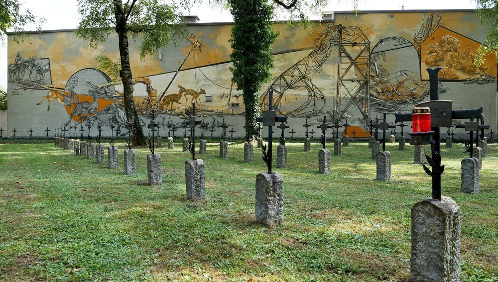 Mural 'Stop Bombing Civilians' des Künstlerduos VIDEO.SCKRE am Linzer St.-Barbara-Friedhof